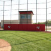 Backstop Padding Installed on Chain-link Fence