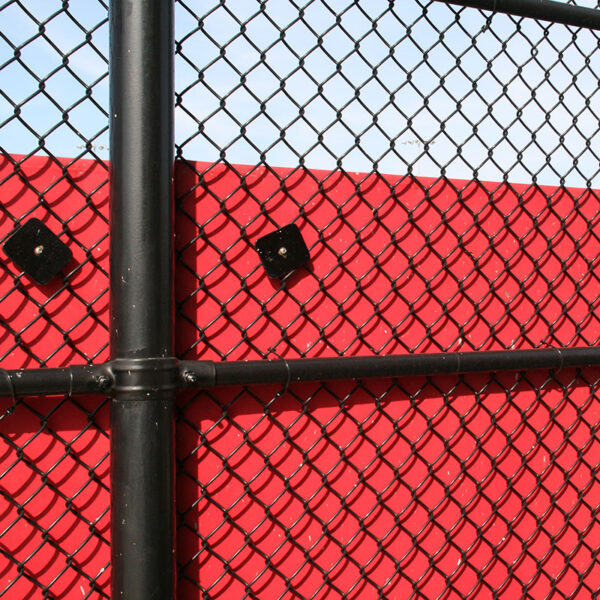 Backstop Padding Installed on Chain-link Fence