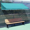 Green tennis court fence cabana