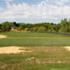 Softball field windscreen