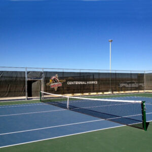 Custom windscreens around tennis court with logos